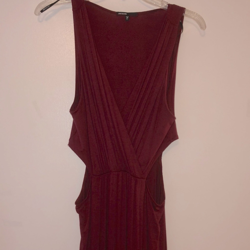 floor length dress with deep v-neck, slit, 2 “cut outs” just above the hips